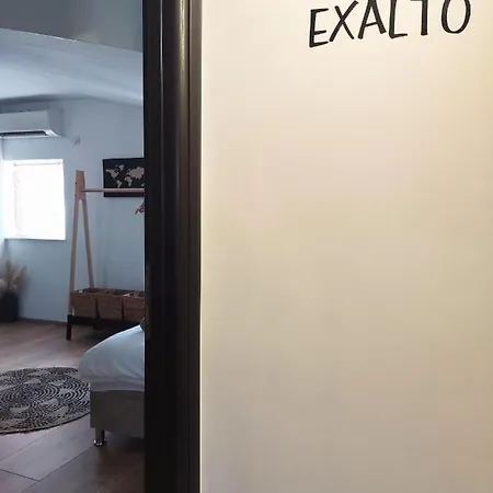 Exalto Трогір